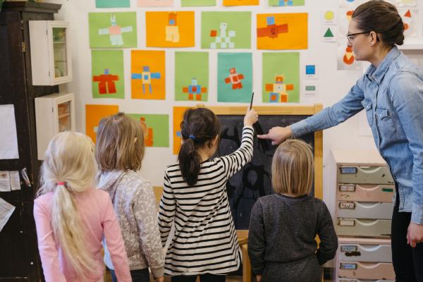 Teacher and children at a Finnish kindergarten. Photo by Elina Manninen / Kuvatoimisto Keksi / Finland Promotion Board